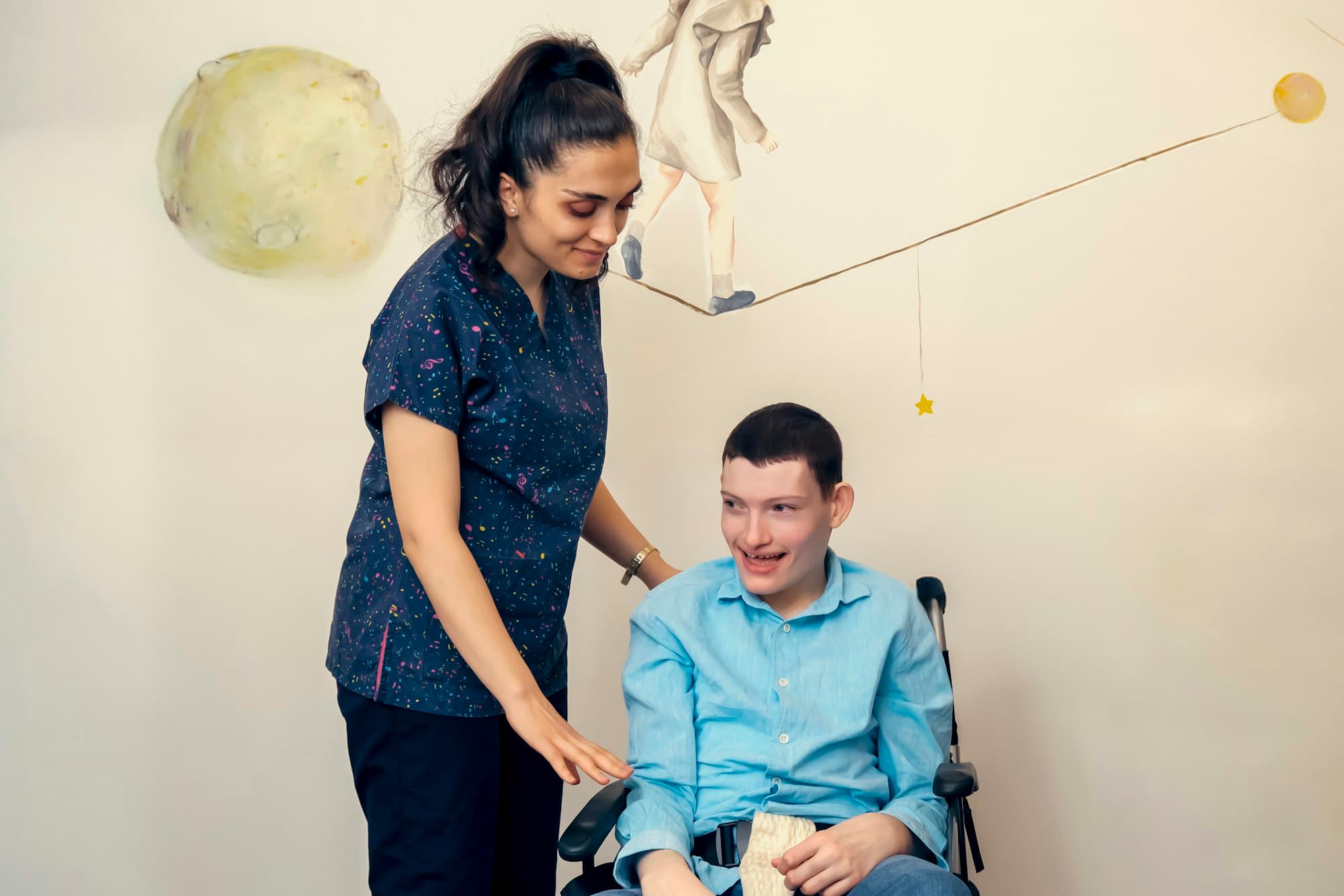 A support worker walking alongside someone she assists